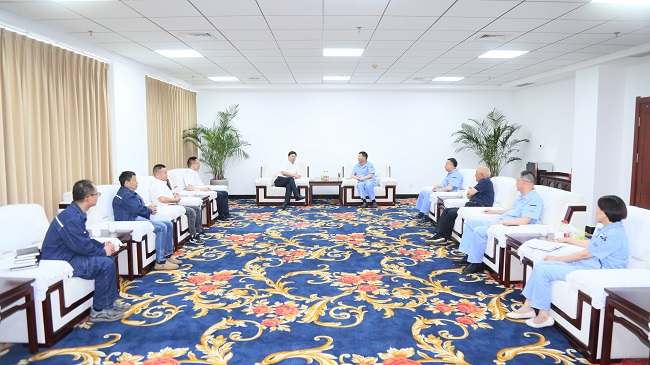 中電建河南工程有限公司黨委書記、董事長劉長龍一行到萬基控股集團交流訪談